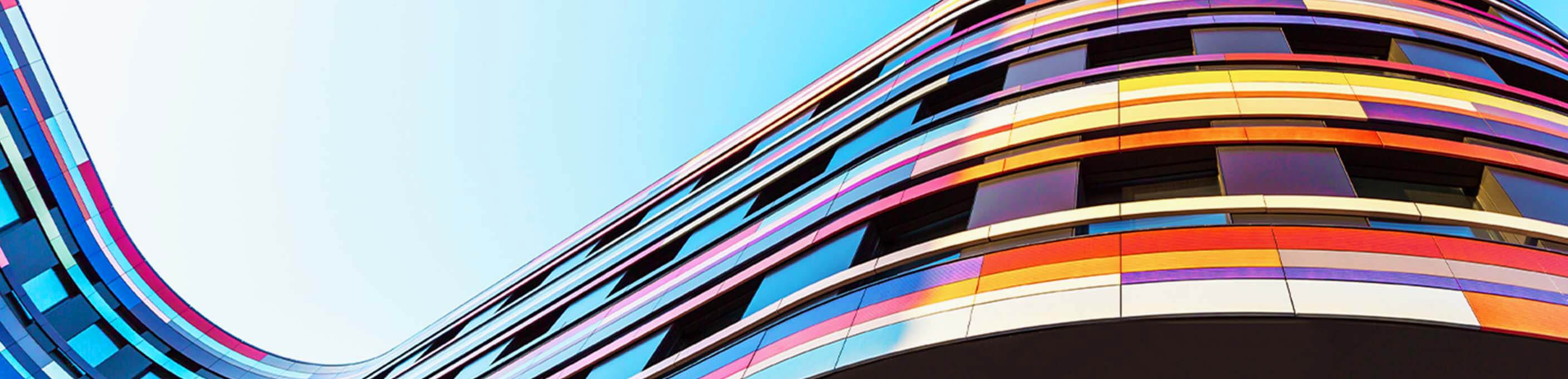 Abstract colorful buidling against sky