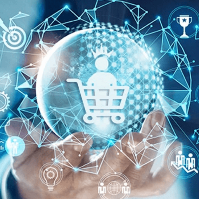 A hand holding a globe showing consumer activities.