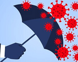 An illustration of the concept of a hand holding an umbrella to keep virus particles away. 