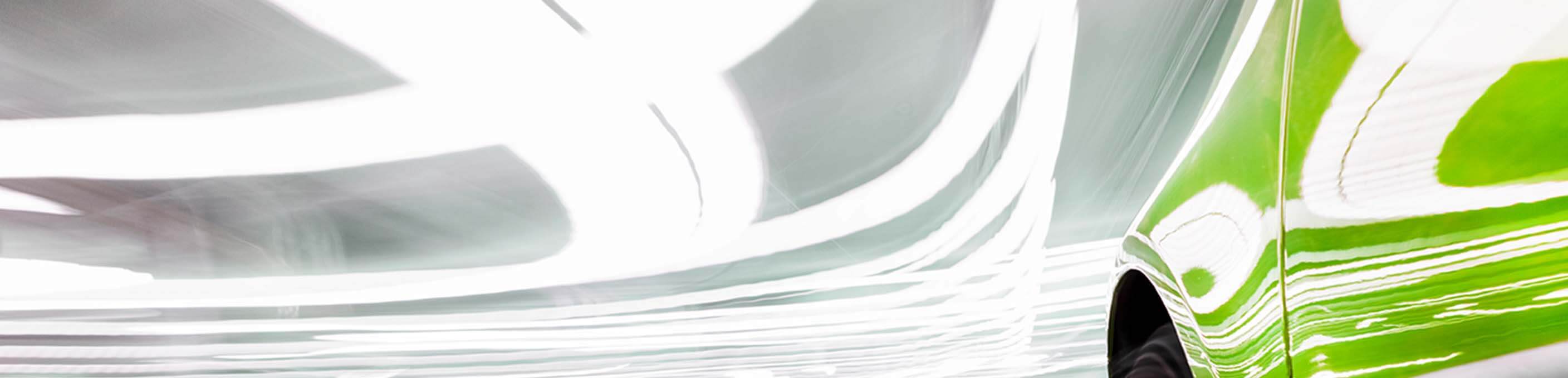 Abstract image of a green electric car.