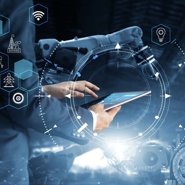A photo of a businessperson using a tablet computer, with icons of robots and innovative technologies superimposed on it.