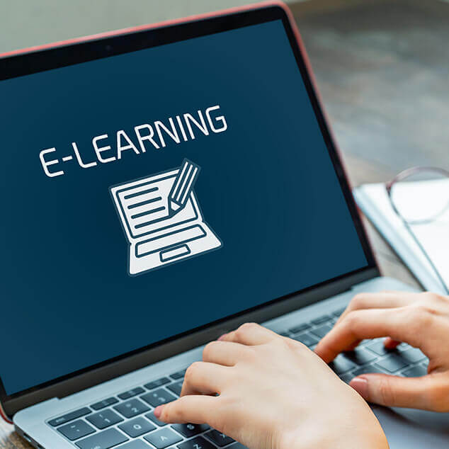 Laptop displaying e-learning screen