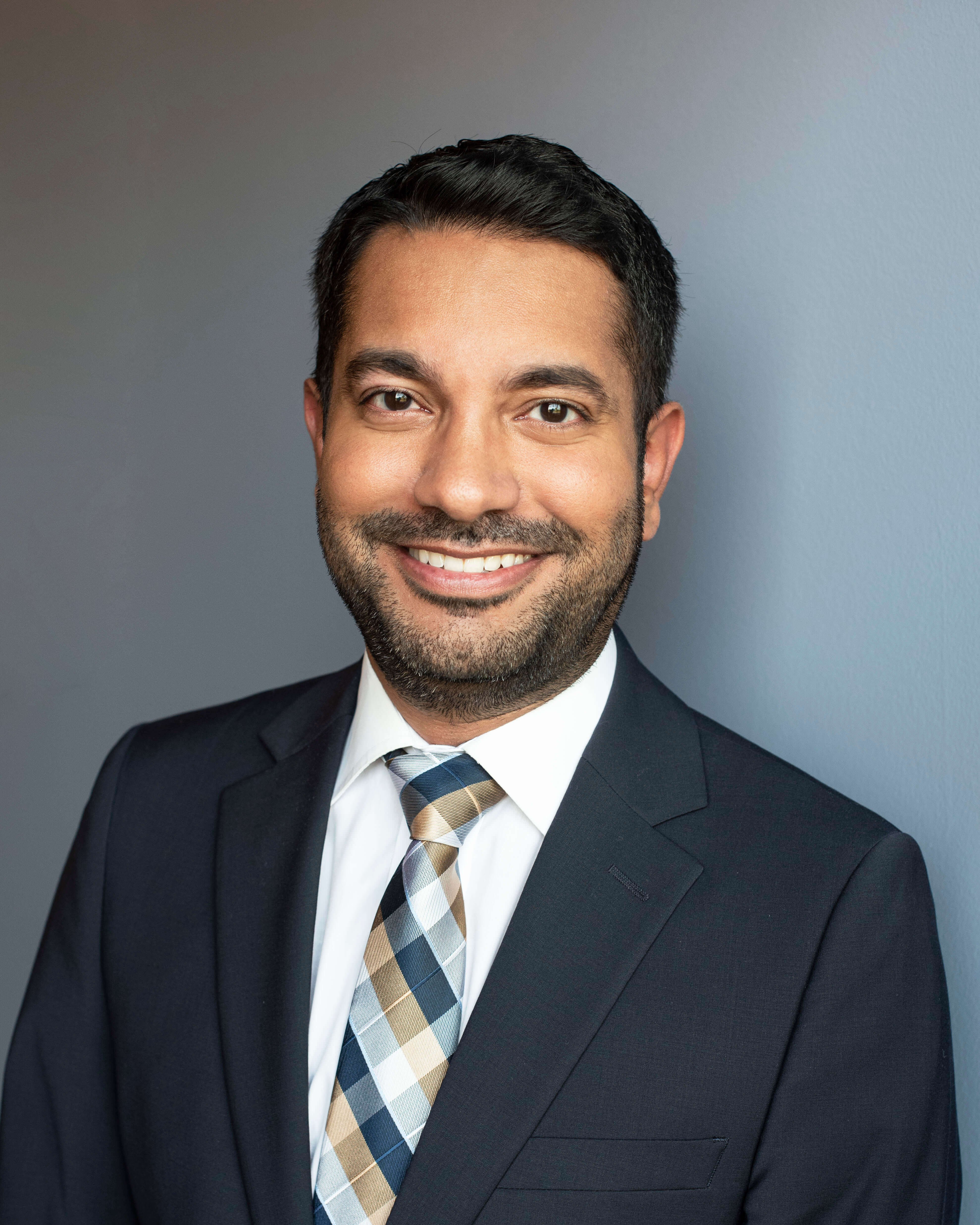 Headshot of Dev Gowda