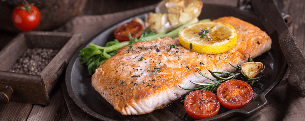 Fish and vegetables in a pan