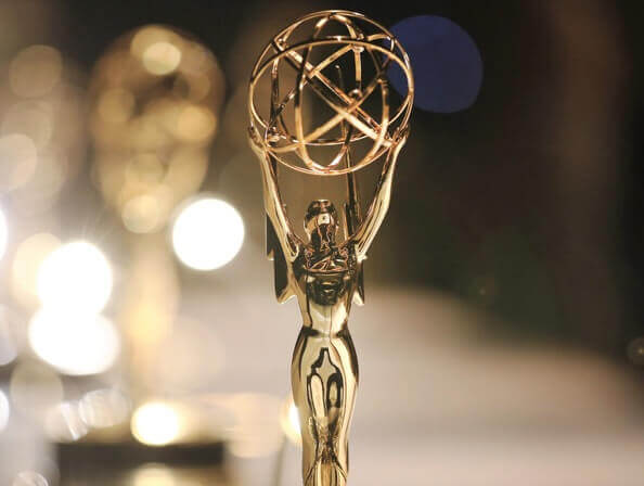 A closeup of an Emmy Award stature. 